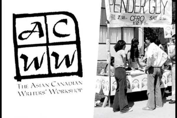 Archival photo from the 1970's of people standing by a display table at the Asian Canadian Writers' Workshop.