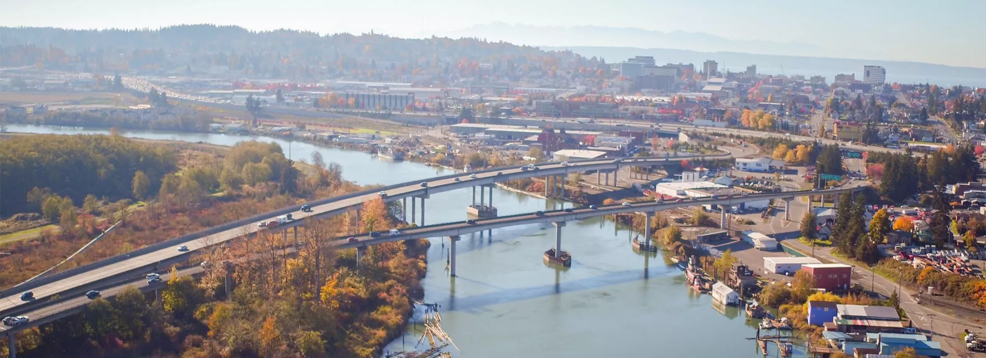 The city of Everett Washington with a bridge and a cityscape