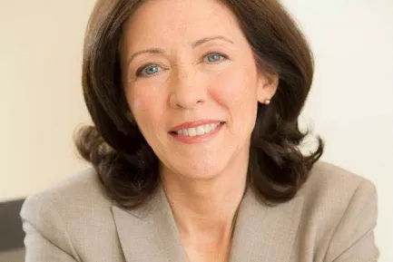 Senator Maria Cantwell wears a light colored suit jacket.